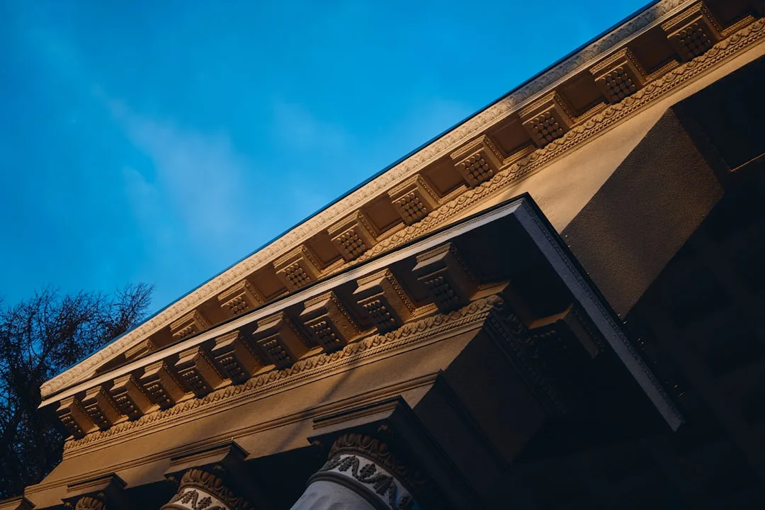 Architectural detail of a building against blue sky