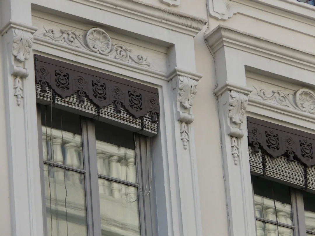Ornate architectural detail on building windows.
