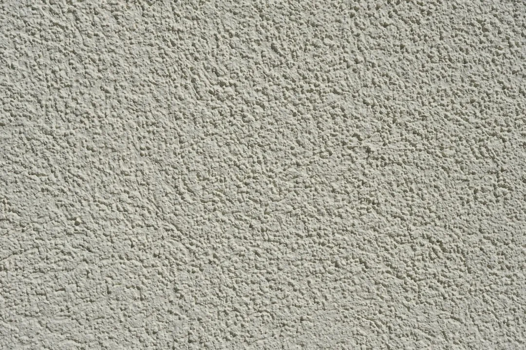 a close up of a wall made of cement